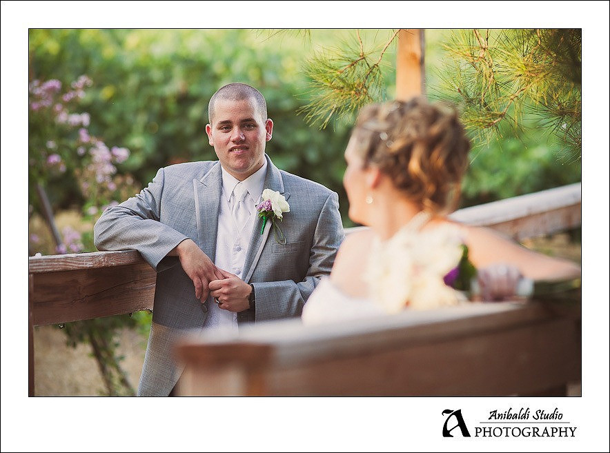 groom on bridge at Longshadow Ranch