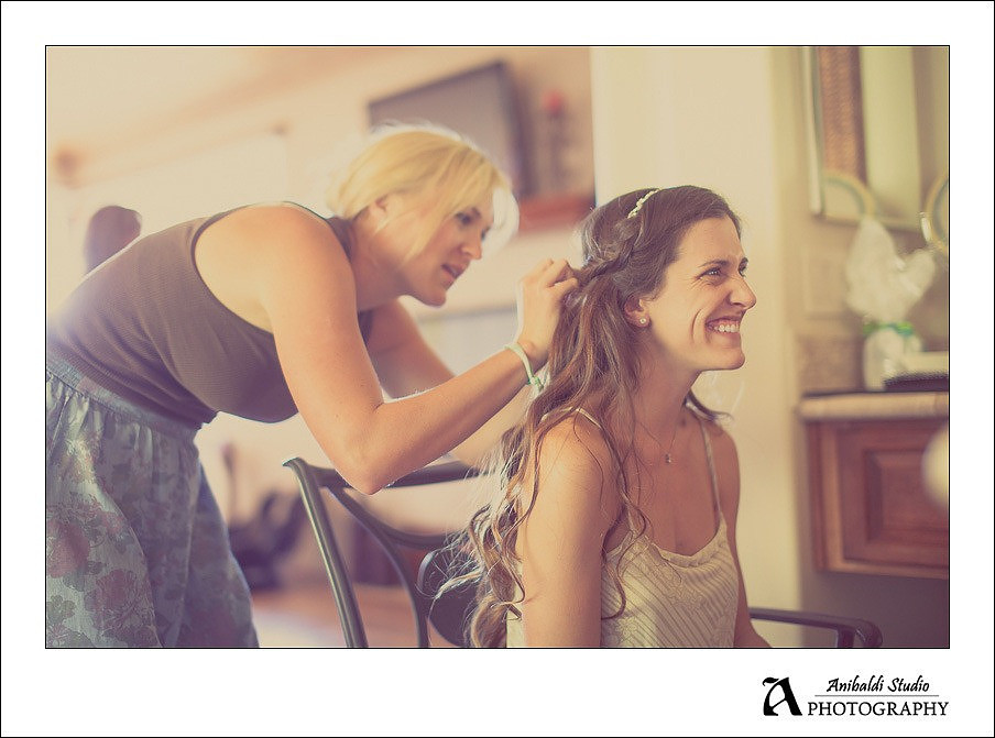 bride getting hair styled