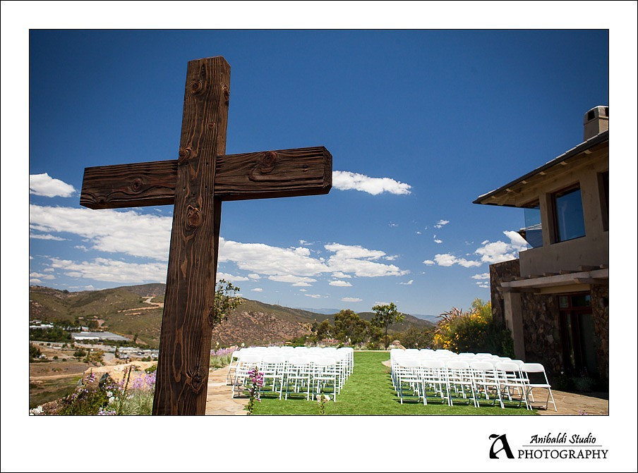 above the clouds wedding ceremony with cross