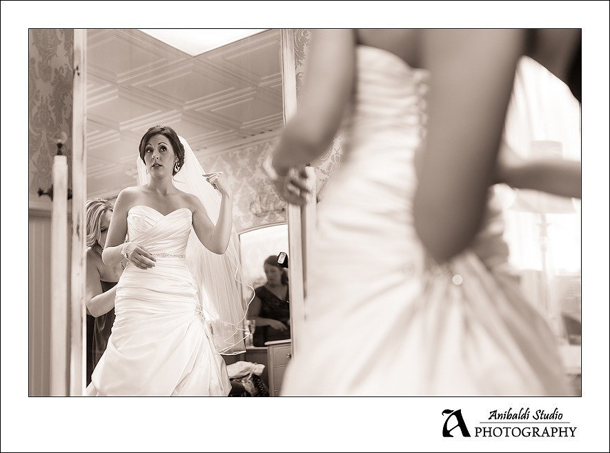 bride in front of mirror