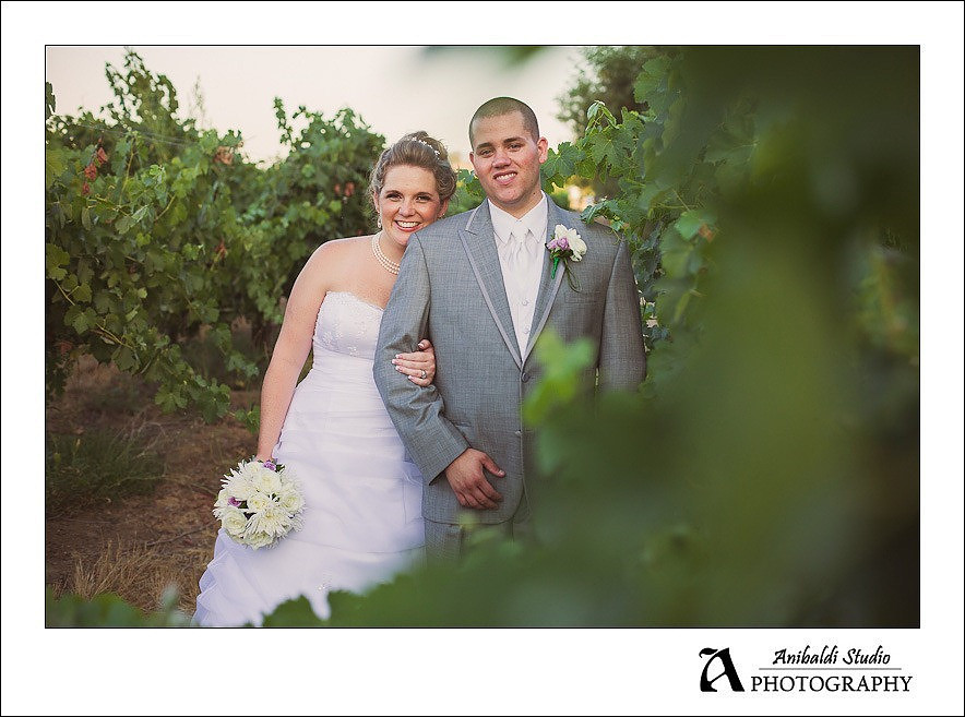 longshadow ranch bride and groom in vineyard