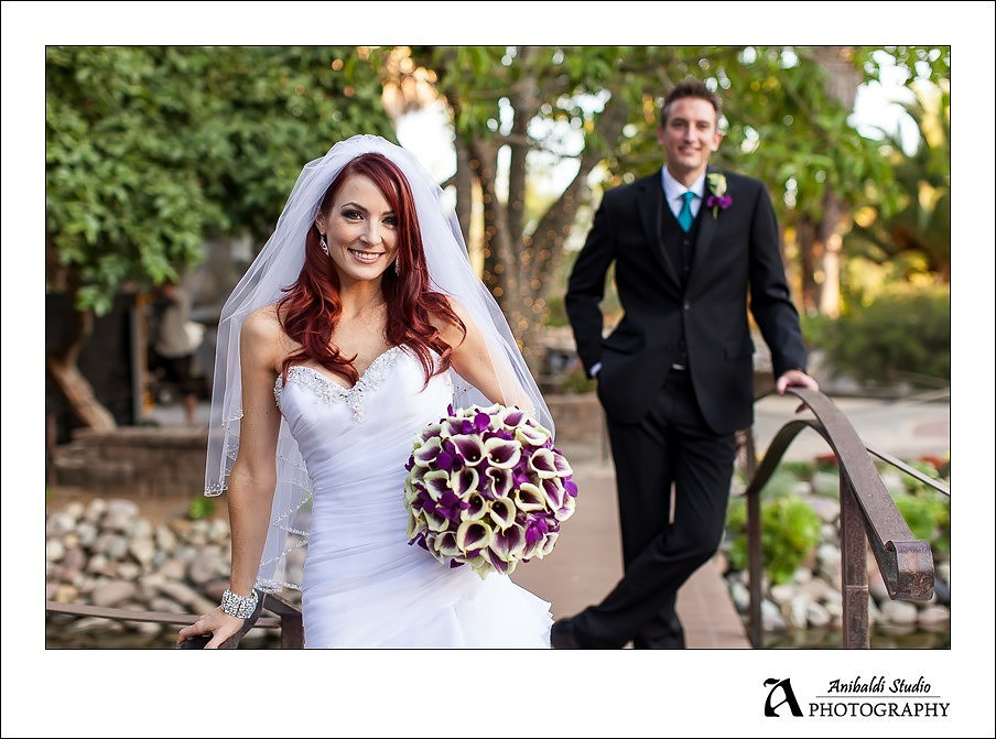 Stone Gardens Wedding Photograph of Bride and Groom on Bridge