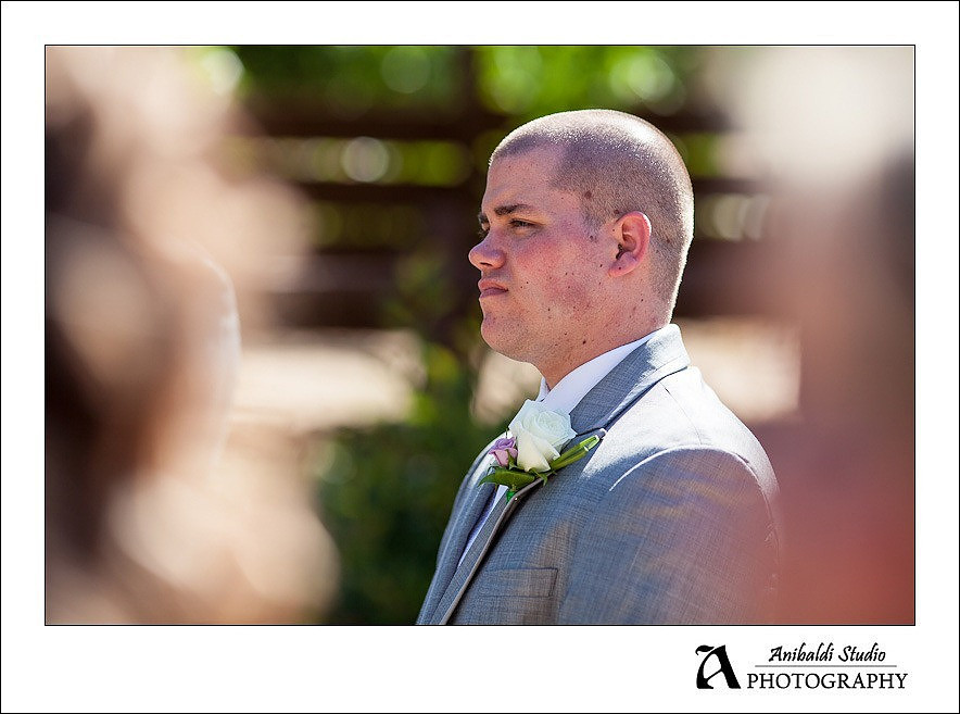 groom looking at bride
